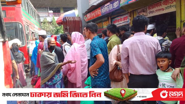 Dhaka bus terminal is overcrowded, extra fare has to be paid