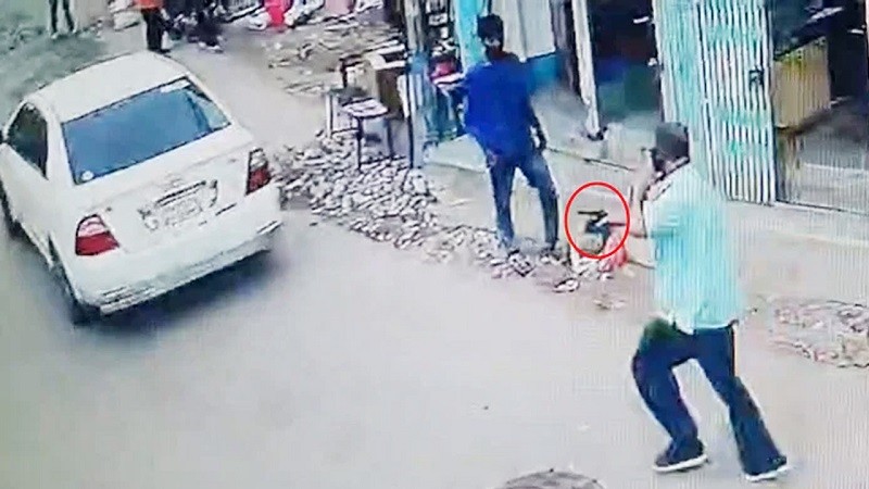 A white car came and picked him up, one of them ran after him to shoot