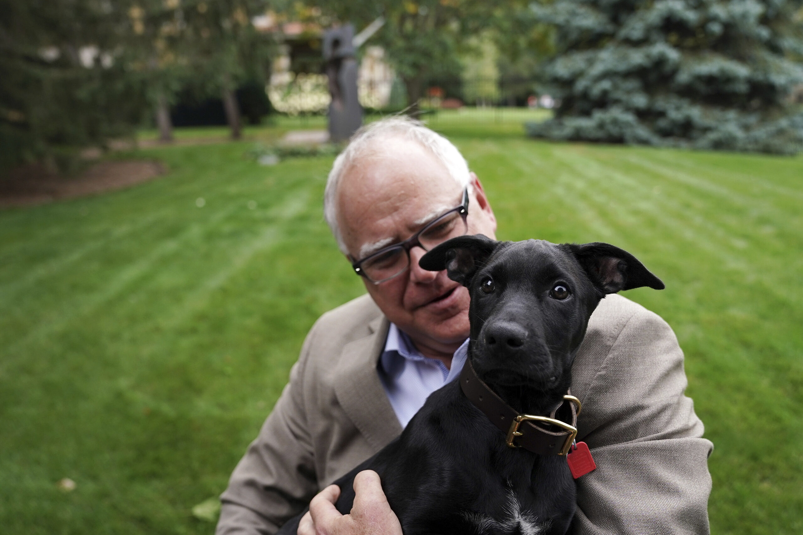 Tim Walz’ Attacked by MAGA Over Dog Photos