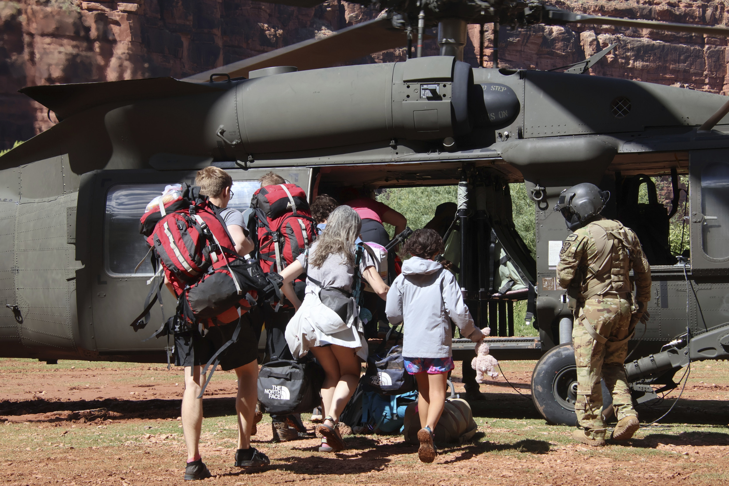 Grand Canyon Tourists Airlifted from Floods via Blackhawk Helicopter: Video