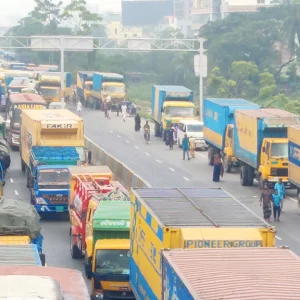 Heavy traffic jam on Dhaka-Chittagong highway, people are going to office on foot