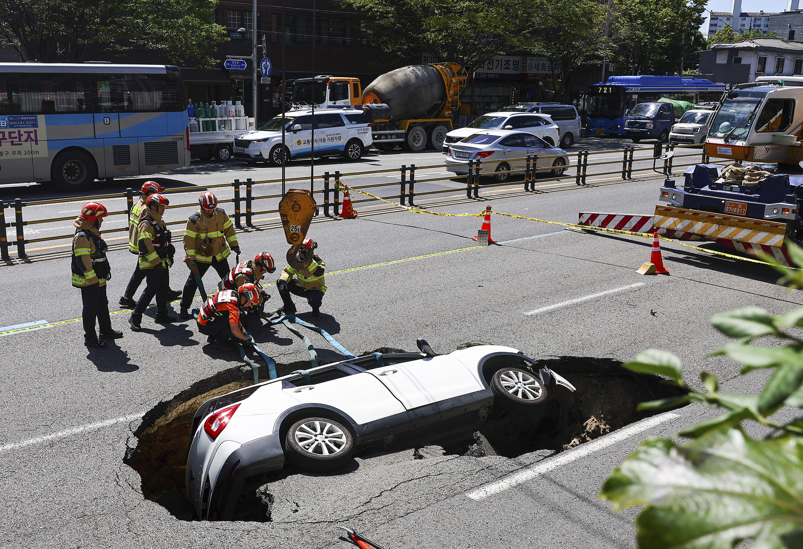 Watch: Sinkhole Swallows SUV – Newsweek