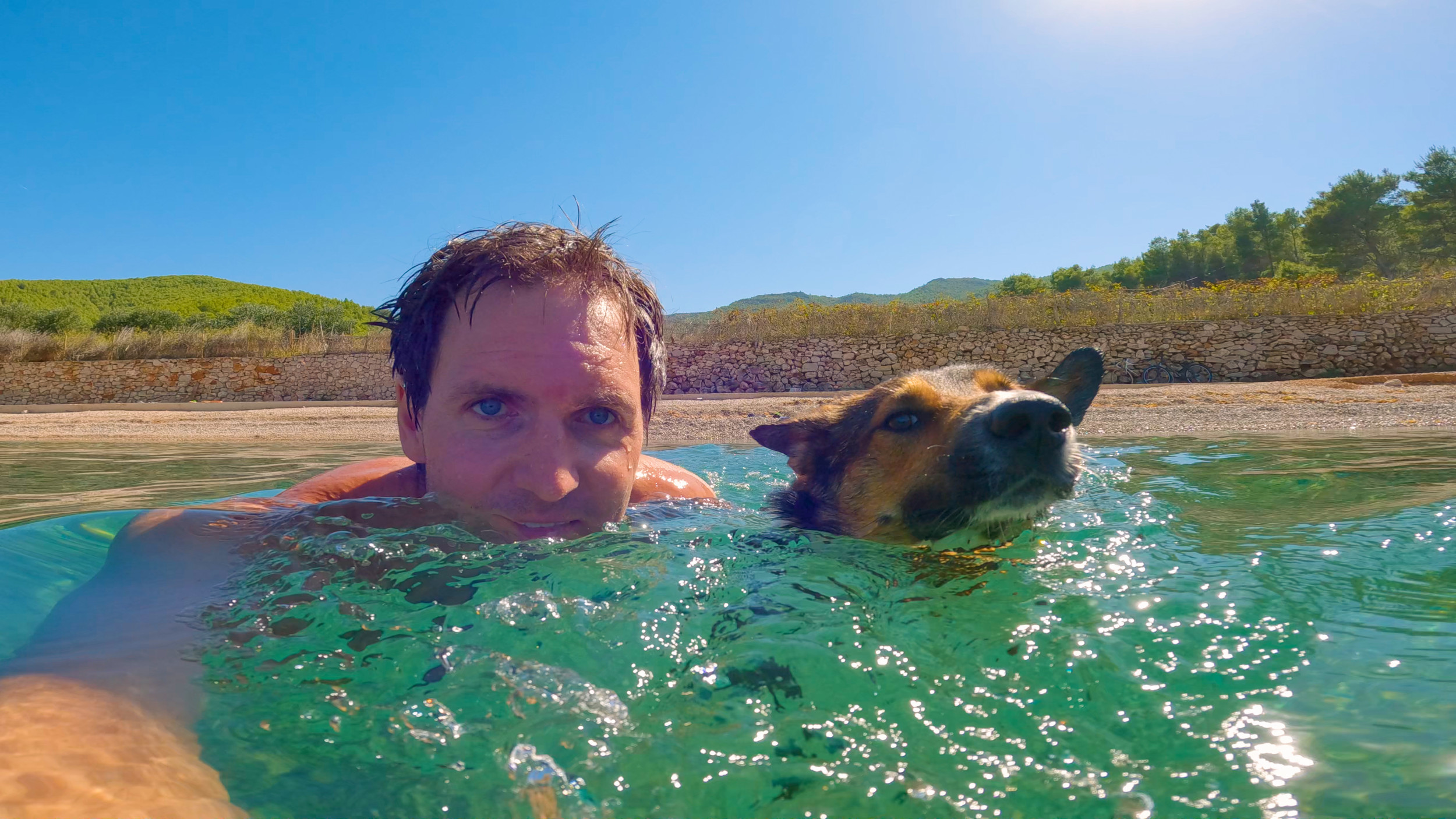 Woman Films Moment Boyfriend Saves Stray Dog From Drowning